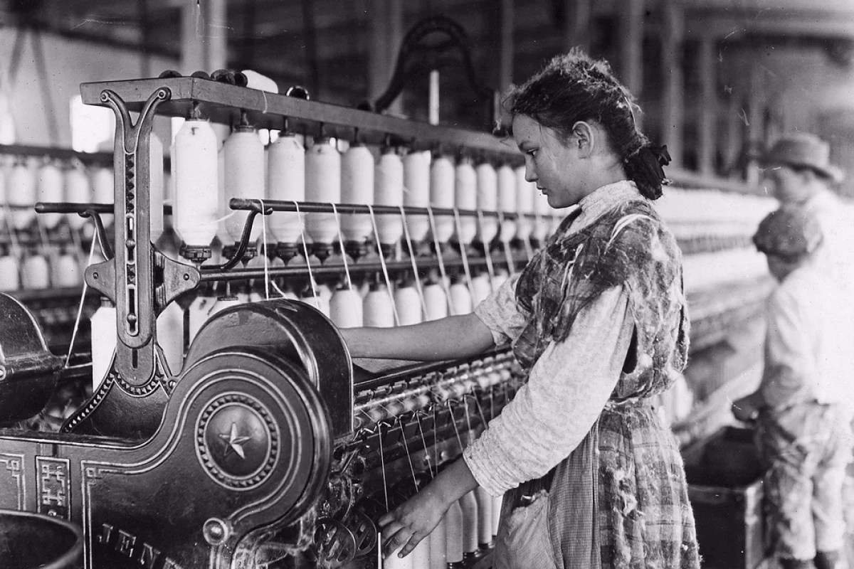 Old mill machines and hands at work